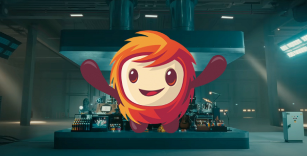 Image of Tony, mascot of the Vivaldi browser. He’s shown lifting a crusher that was used to crush musical instruments and other objects in a recent ad by Apple to promote their latest iPad Pro. 