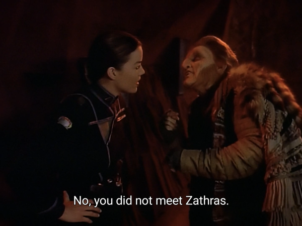 (1 of 2) Picture of Ivanova and Zathras on Epsilon 3. Ivanova is dressed in an Army of Light uniform:

The caption reads: "No, you did not meet Zathras."