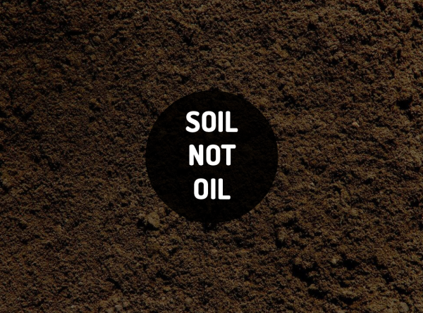 SOIL NOT OIL 
Written on a soil background