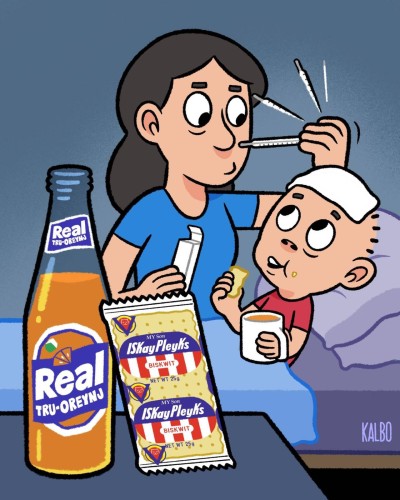 Mother shaking thermometer over her son with face towel on his forehead. In the foreground, there is an orange soda and crackers