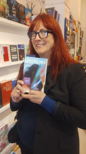Author Rachael King with her novel The Grimmelings in the Edinburgh Bookshop