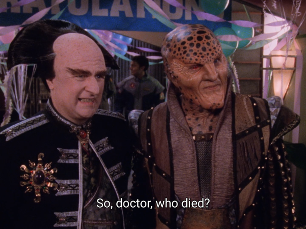 Picture of Londo and G'Kar. Behind them are decorations (a "Congratulations" sign and paper streamers).

The caption reads: "So, doctor, who died?"