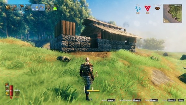 Screenshot from the game Valheim.

It shows my Twink standing in her new iron chain mail, in front of a house under construction. The lower parts consist of three rows of stone, with wooden walls on top of that.

The right side is finished, with a thatched roof and an elevated ridge on it to allow the smoke to clear.

The house sits on a green hill. There are lush trees in the background, indicating that this is in the Meadows.