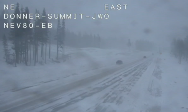View of Donner Summit 5/29 1627 - lots of snow, wind, but cars are still moving