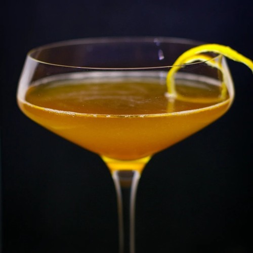 The cocktail itself in a chilled coupe and garnish with a lemon twist