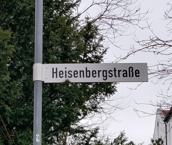 A street sign that says "Heisenbergstrasse"