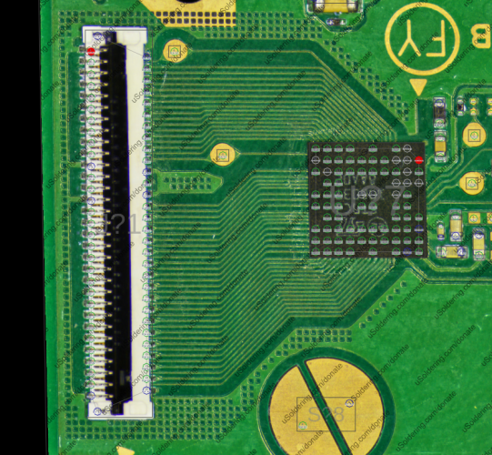 a cropped view of the nintendo switch lite pcb. there’s an ffc connector with many many parallel data lines going to a bga ic. the entire area between and around the bga component and ffc connector is ring fenced with a 3 deep wall of tightly packed vias. 