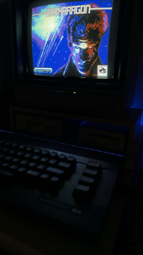 Phot of my C64 and 1702 monitor with new game Harharagon splash screen 