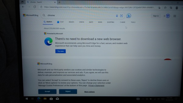 A Bing search for Chrome in Microsoft Edge. A huge pop-up says "there's no need to download a new web browser"