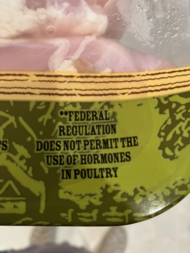 A package of chicken harshing my mellow by reminding me that Federal Regulation forbids letting chickens have hormones. Because HRT would make them too powerful to consume. 