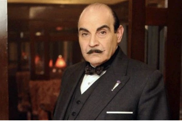 A picture of David Suchet as Poirot, on the Orient Express.