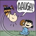 Cartoon: Lucy pulls away the American football, as Charlie Brown attempts to kick it & he flied into the air having missed his footing (as she has done soooo many times before)