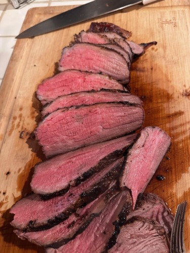 Tri-tip roast. 1 hour on the smoker, then finished in my infrared propane broiler.