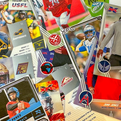 A collection of assorted American football trading cards featuring players and team logos.