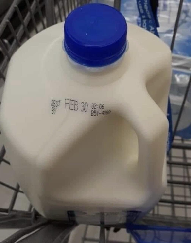 A gallon of milk with the best by date “February 30th”
