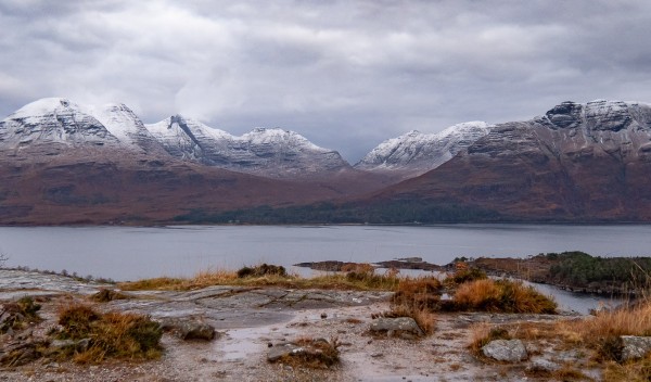View of three snow capped Munros.
