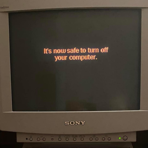 An old Sony CRT monitor displays the Windows 95 shutdown message: "It's now safe to turn off your computer."