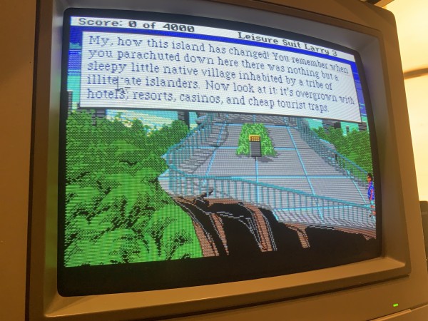 The opening scene showing Larry on a lookout point overlooking the beach and city. The game is running on my Amiga with a CRT monitor. 