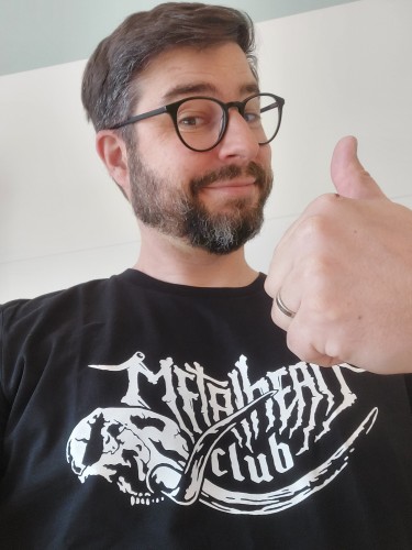 Me wearing my new #metalhead club Shirt, showing thumps up.