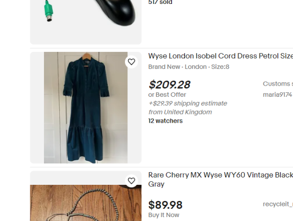 ebay listing. The above and below items are a mouse and keyboard, and the central one is a "Wyse London Isobel Cord Dress Petrol Size", with the thumbnail showing a blue dress 